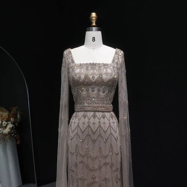 Elegant Beaded Evening Dress with Flowing Cape Sleeves SS089