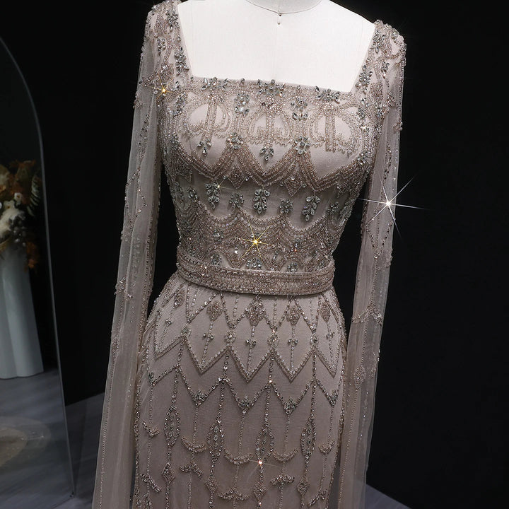 Elegant Beaded Evening Dress with Flowing Cape Sleeves SS089