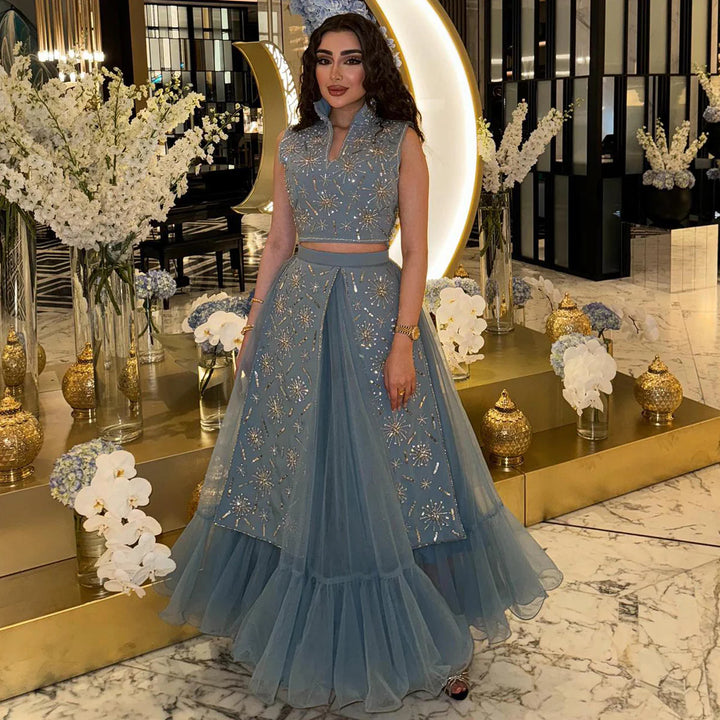 Elegant Blue Two-Piece Beaded Evening Gown with Ruffle Skirt SS597