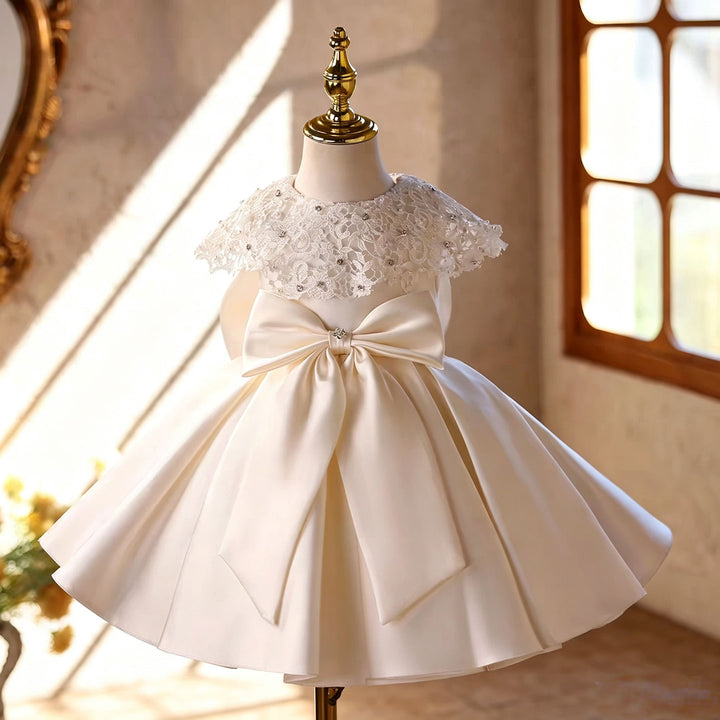 D295 off white lace rhinestone bow dress detail