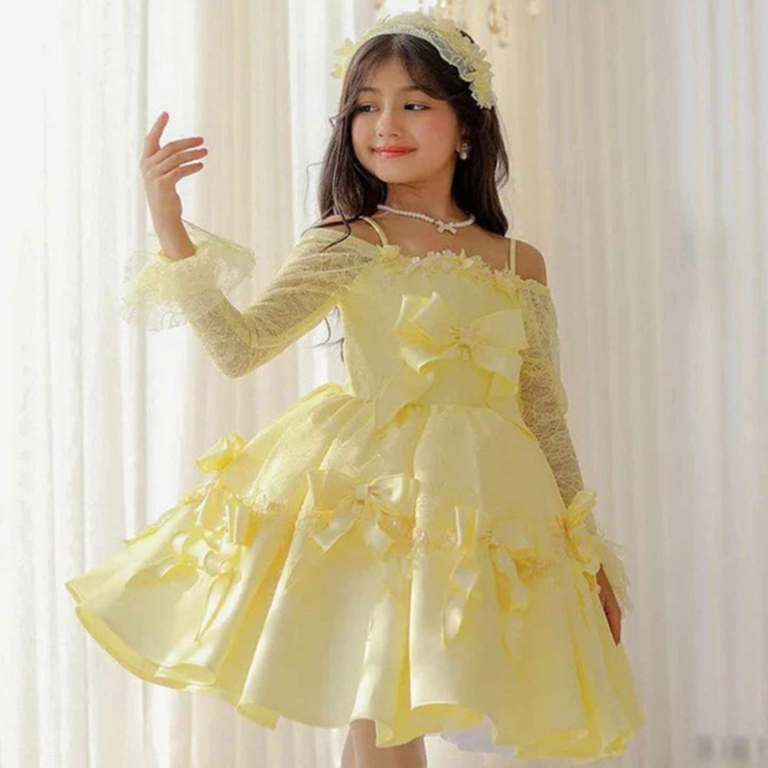 D296 yellow lace sleeve and bow dress detail