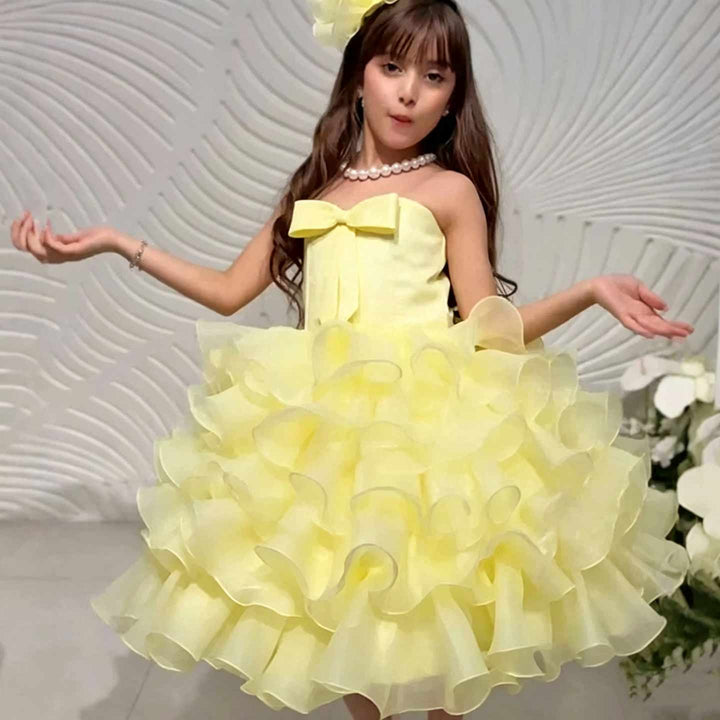 D297 yellow strapless ruffle flower girl dress front