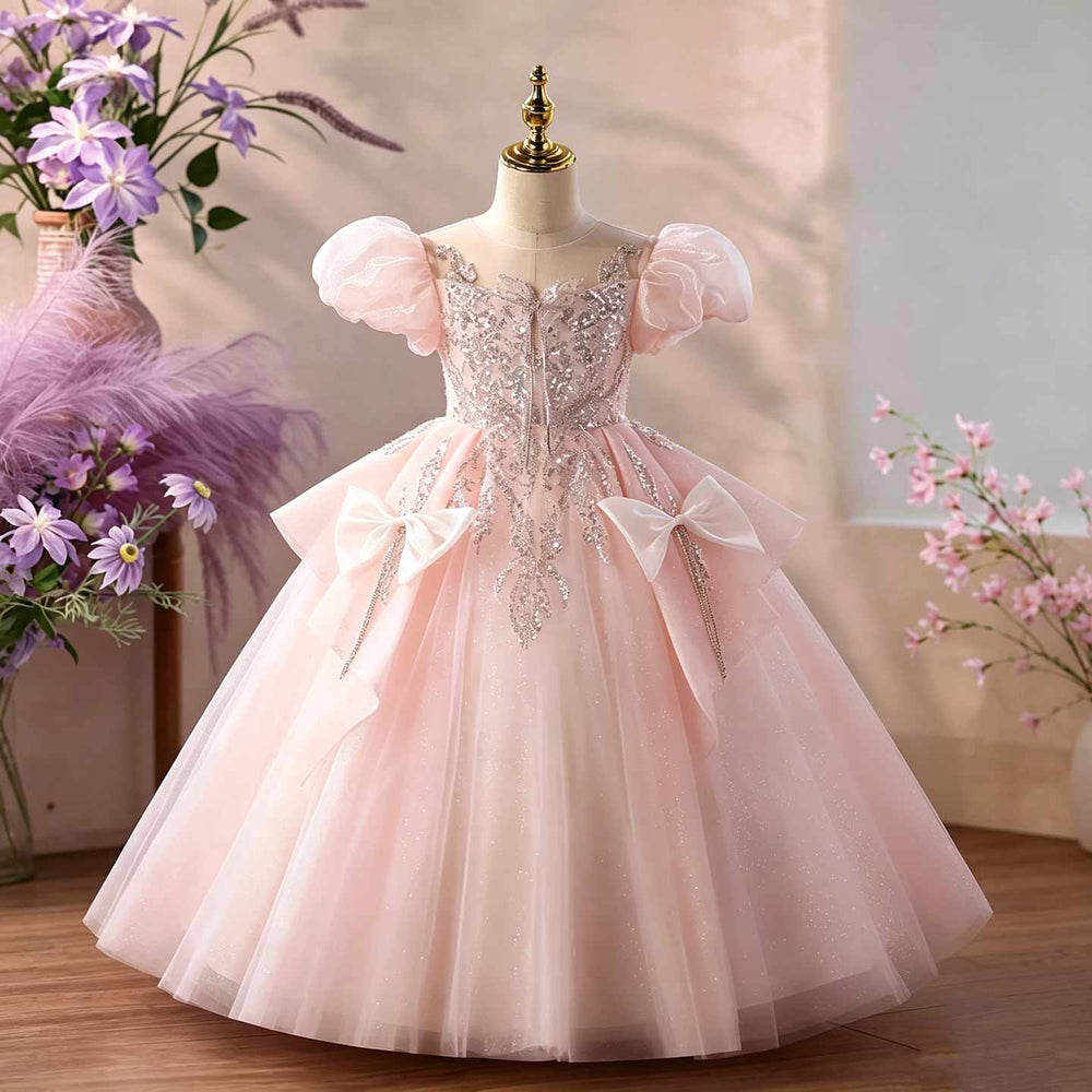Pink puff sleeve beaded bow girls ball gown D377, front