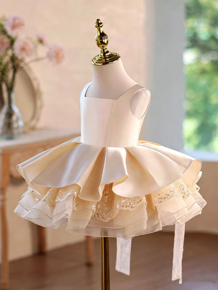 Champagne D606 girls dress three quarter front