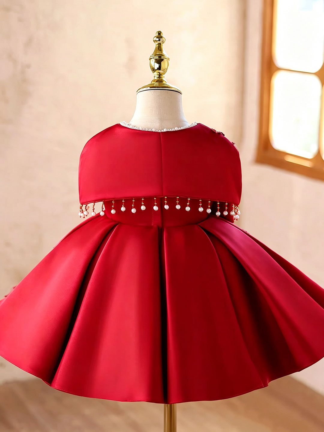Red D607 girls dress back with cape