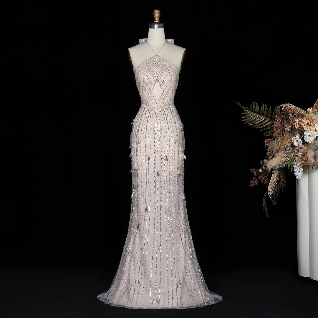 Dreamy Vow SS496 blush pink crystal beaded halter mermaid gown angled front
