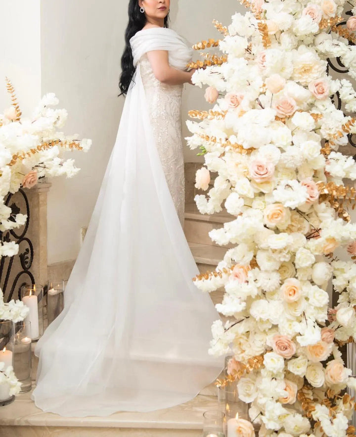 Elegant Off-Shoulder White Mermaid Evening Dress Beaded with Train SS636