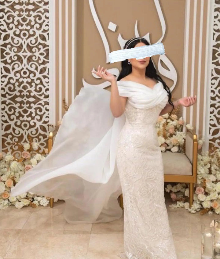 Elegant Off-Shoulder White Mermaid Evening Dress Beaded with Train SS636