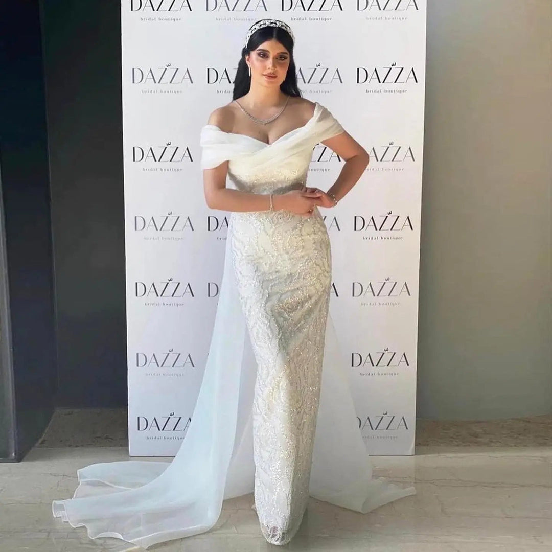 Elegant Off-Shoulder White Mermaid Evening Dress Beaded with Train SS636