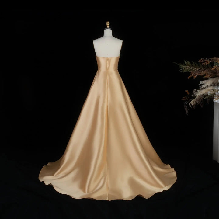 Elegant Golden Strapless Evening Dress with Sparkling Embellished Bodice SS377