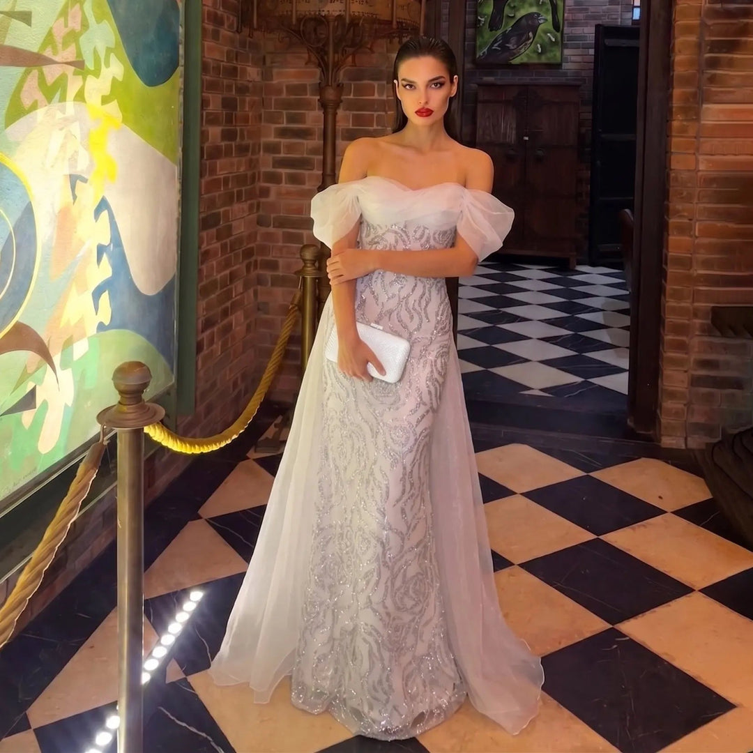 Elegant Off-Shoulder White Mermaid Evening Dress Beaded with Train SS636