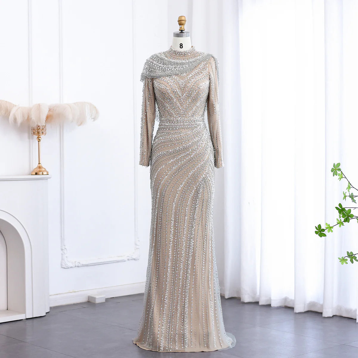 long sleeve beaded dress La Femme Short Hoco 32564 Black / 00 while the sheer embellished cape sleeves bring graceful movement to the silhouette Samira Long Sleeve Beaded Dress